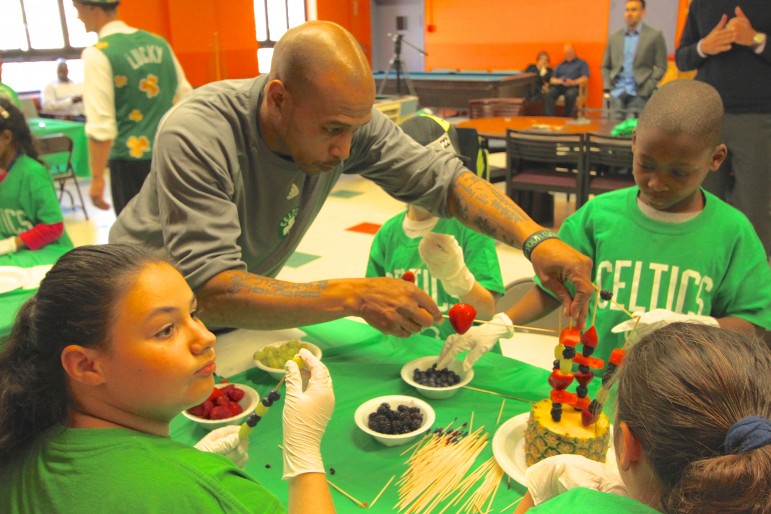 Former Boston Celtics player Dana Barros gives a hand creating some healthy desserts.