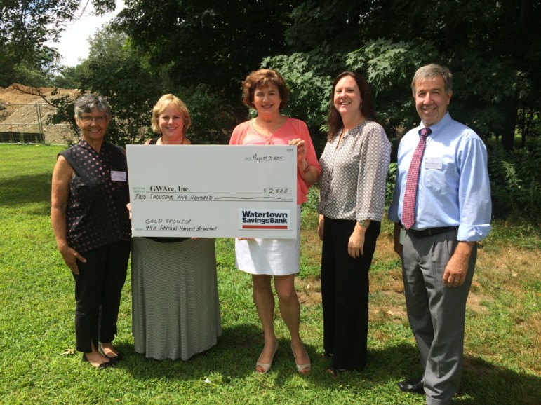 Watertown Savings Bank officials present a check to the Greater Waltham Arc. From left, WSB Vice President and Marketing Officer Carole Katz; WSB Assistant Vice President and Waltham resident Rose Herron; GWarc Executive Director Roz Rubin; WSB Community Relations Manager Kelly Cronin; and WSB Assistant Vice President, Facilities Manager Brian Murphey.