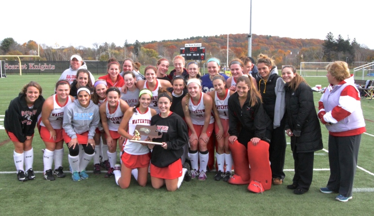 The 2014 version of the Watertown field hockey team - posing with the North Section championship trophy -  has been dominant - even for Watertown. 