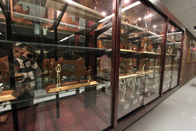 The new trophy case for Watertown High School's athletic silverware was created by at teacher and student.