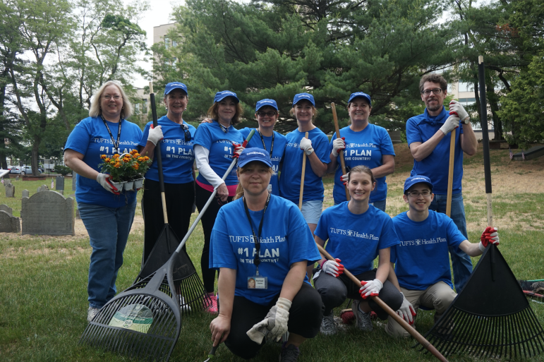Volunteers from Tufts Health Plan cleaned up the Old Burying Ground on Arlington Street. Pictured, Back row (left-right): Colleen Gallagher, Sally Bennett, Sheila Batson, Kathleen Hewes, Marybeth Allen, Lynn Monahan, Kit Gorton. Front Row (left-right): Rachael Duprez, Erica Thomas Meduri and Noah Karr.