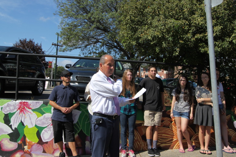 East Watertown's John Airasian recalled his memories of Coolidge Square during the celebration of the new mural painted by Watertown High School students.