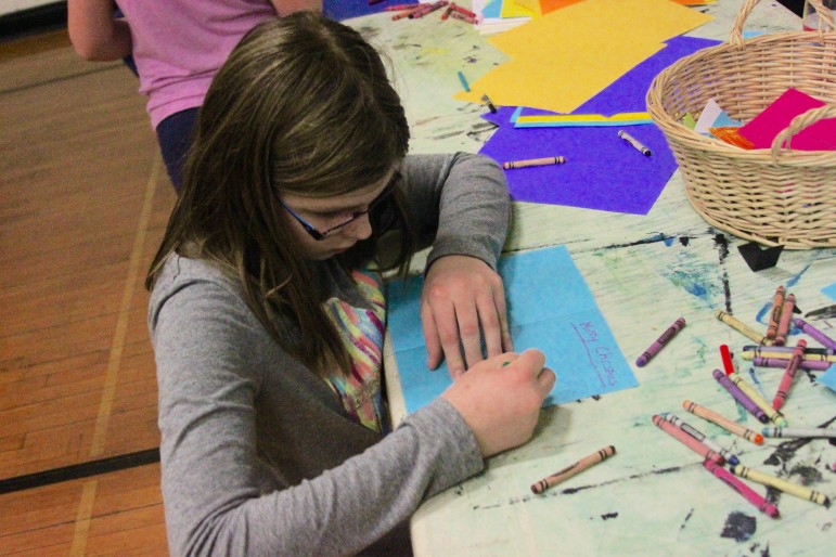 Members of the Watertown Boys and Girls Club wrote cards to send to troops via Operation American Soldier.
