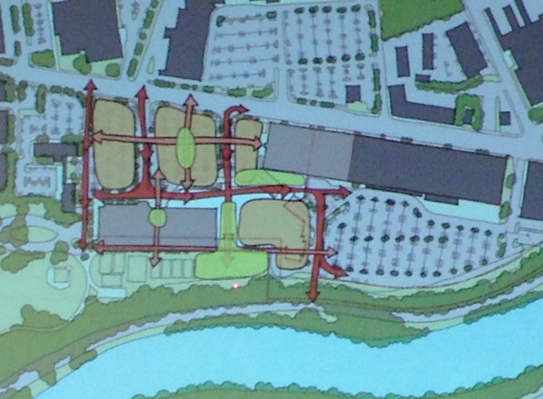 An illustration by architect Eric Brown showing traffic patters, and open spaces. The orange shows new buildings, and yellow shows public gathering areas.