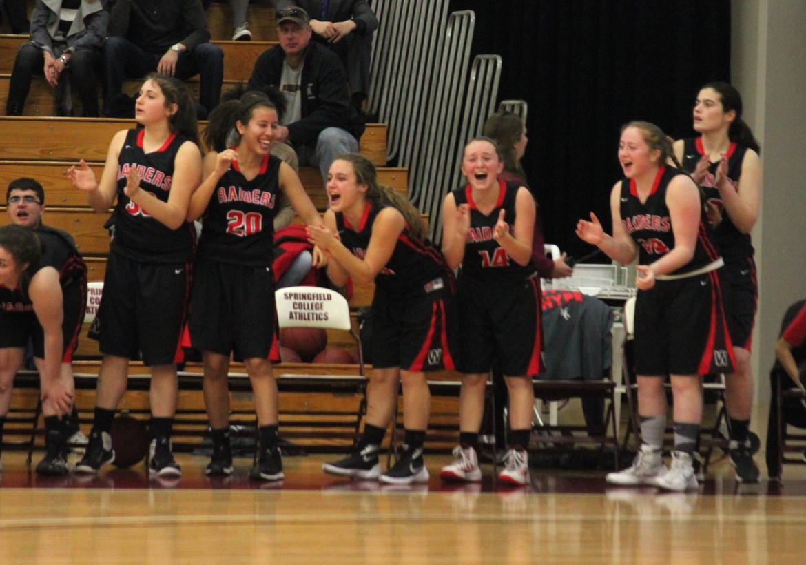 The Watertown bench celebrates as the girls basketball team made a run to take the lead against Longmeadow in the state final.