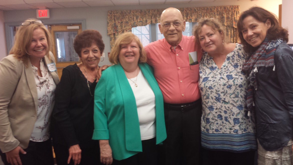 New Director Anne-Marie Gagnon found a dedicated and knowledgable staff when she arrived. Here Gagnon, far left, is show with, second from left Helena Cavallaro; Debbie Dunn, Program Coordinator; Joe Cavallaro, retired Senior Shuttle Driver; Rae Grassia, Principal Account Clerk; and Marina Kirsanova, Case Worker. 